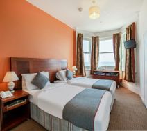 OYO The Strand Hotel Room