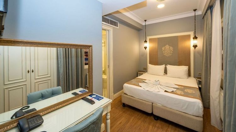 Raymond Blue Hotel Room