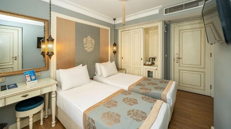 Raymond Blue Hotel Room