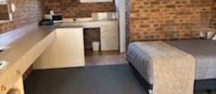 Settlement Motor Inn Room
