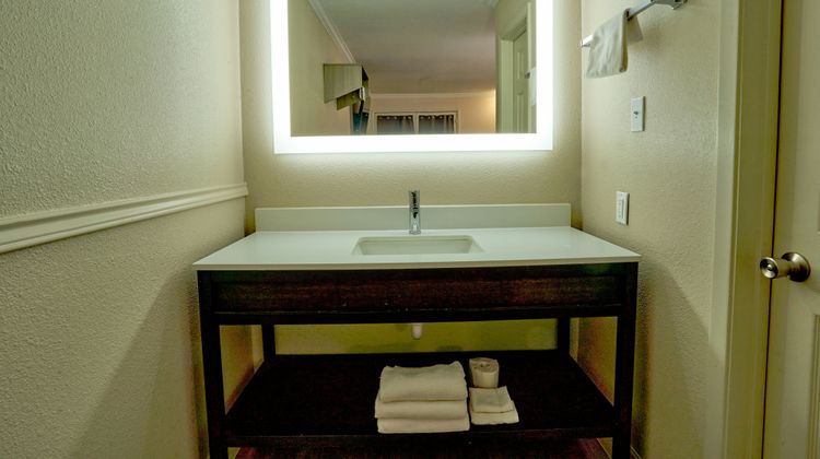 Family Garden Inn & Suites Room