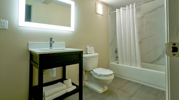 Family Garden Inn & Suites Room