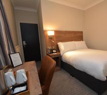 The Rugby Hotel Room
