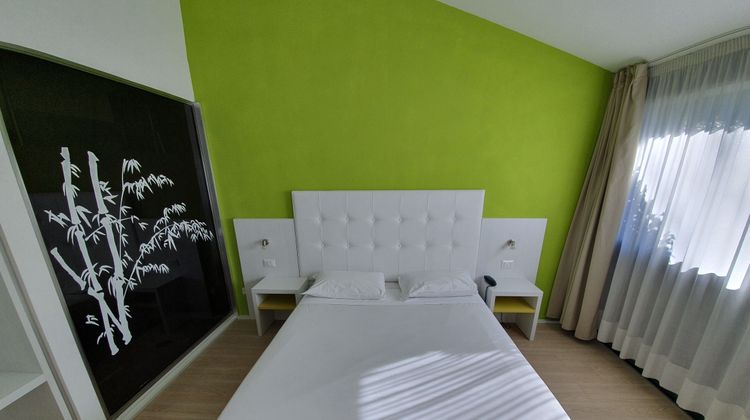 Green Hotel Room