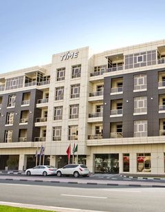 Time Grand Plaza Hotel