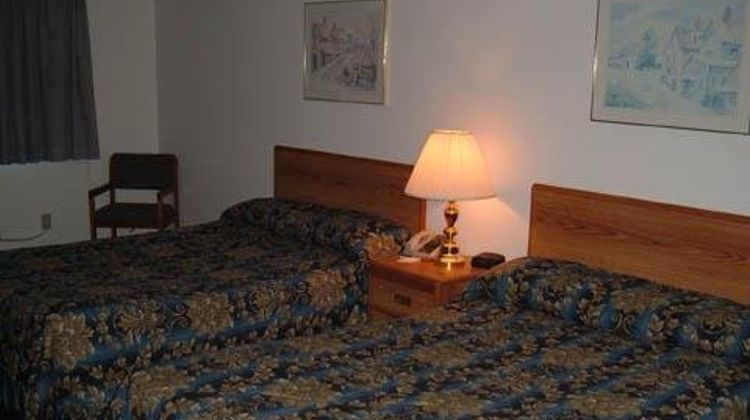 Sky Lodge Inn & Suites Room
