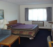 Sky Lodge Inn & Suites Room