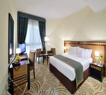 Al Majaz Premiere Deluxe Hotel Room