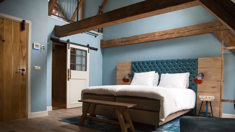 Van Rossum City Hotel Room