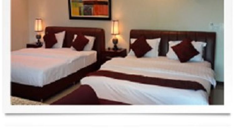 Quint's Travelers Inn Room