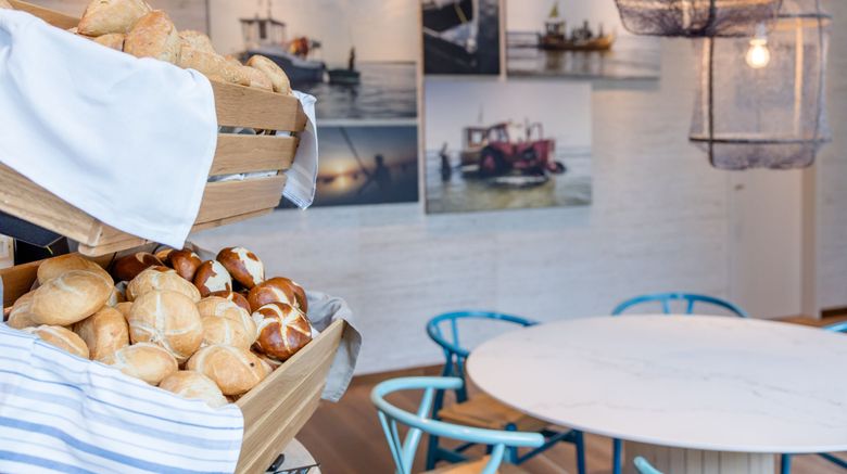 <b>Motel One Rostock Restaurant</b>. Images powered by <a href=https://www.travelagewest.com/Hotels/Rostock-Germany/