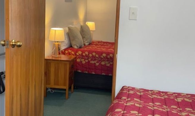 ASURE Ambassador Motor Lodge Room
