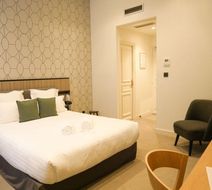 Le Phenix Hotel Room