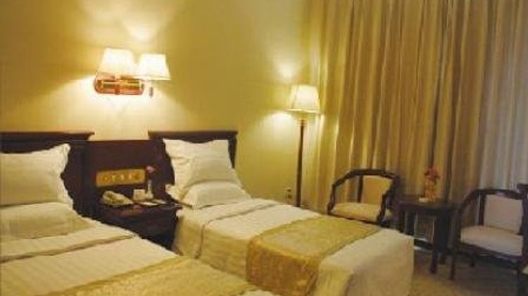 Jinhangxian International Business Hotel Room