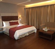 Mahagun Sarovar Portico Room