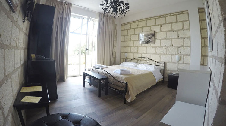 CapoSperone Resort Room