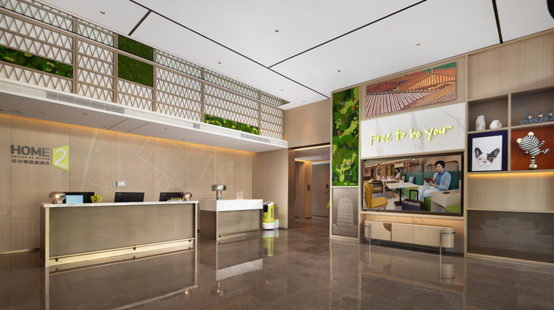 <b>Home2 Suites by Hilton Meishan Dongpo Lobby</b>. Images powered by <a href="https://www.leonardoworldwide.com/" title="Leonardo Worldwide" target="_blank">Leonardo</a>.