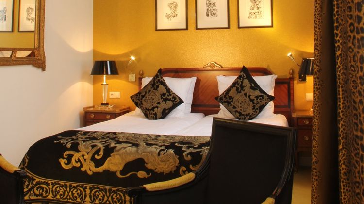 Ambassade Hotel Room