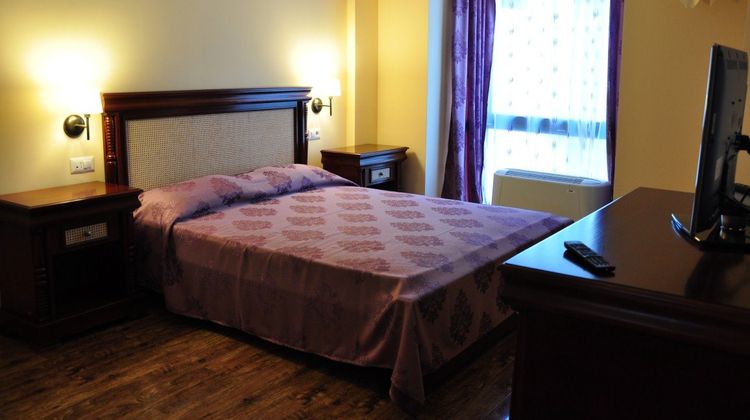 Vigo Grand Hotel Room