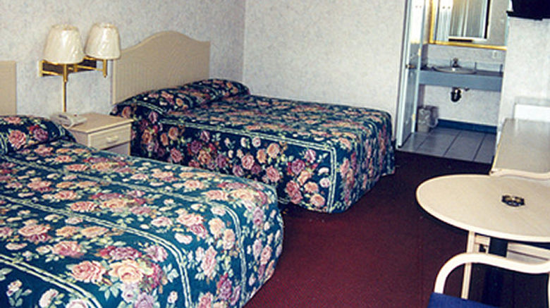 <b>Passport Inn and Suites Room</b>. Images powered by <a href="https://www.leonardoworldwide.com/" title="Leonardo Worldwide" target="_blank">Leonardo</a>.