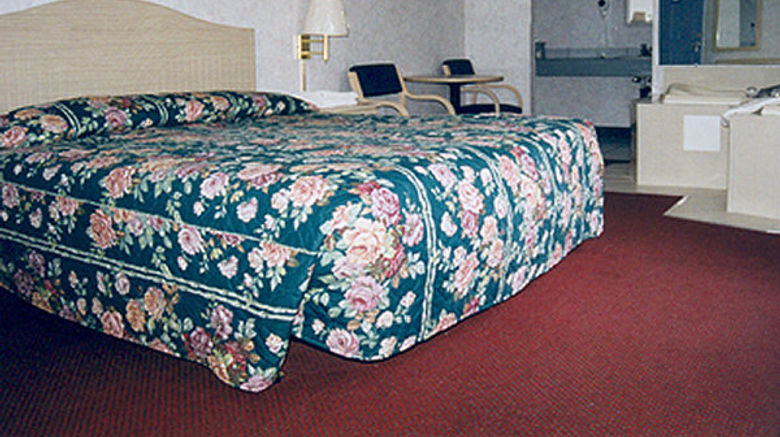 <b>Passport Inn and Suites Room</b>. Images powered by <a href="https://www.leonardoworldwide.com/" title="Leonardo Worldwide" target="_blank">Leonardo</a>.