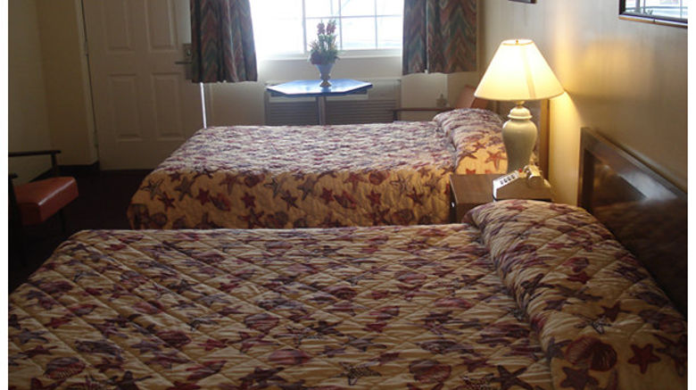 <b>Passport Inn Room</b>. Images powered by <a href="https://www.leonardoworldwide.com/" title="Leonardo Worldwide" target="_blank">Leonardo</a>.