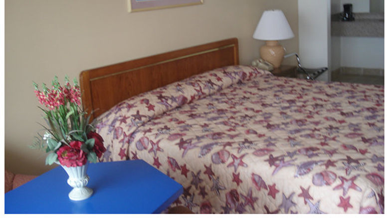 <b>Passport Inn Room</b>. Images powered by <a href="https://www.leonardoworldwide.com/" title="Leonardo Worldwide" target="_blank">Leonardo</a>.
