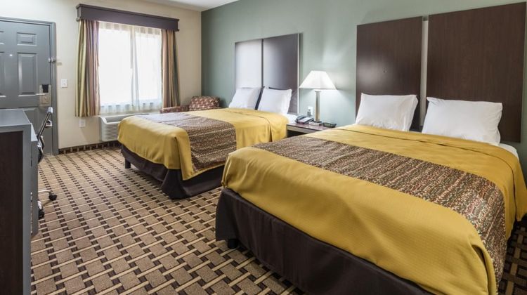 Scottish Inns & Suites Room