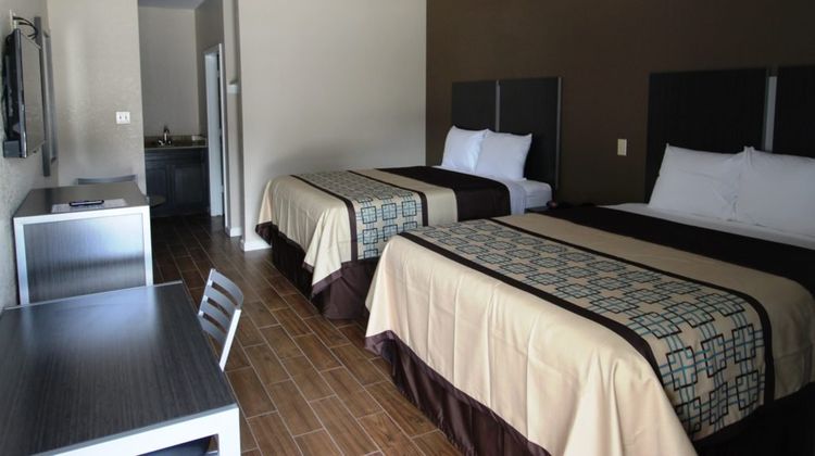 Scottish Inns & Suites Highway146 Room