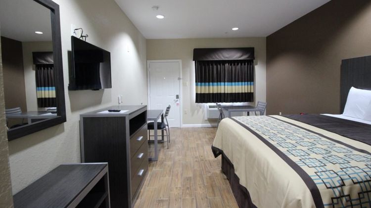 Scottish Inns & Suites Highway146 Room