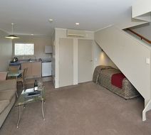 Brougham Heights Motel & Apartments Room