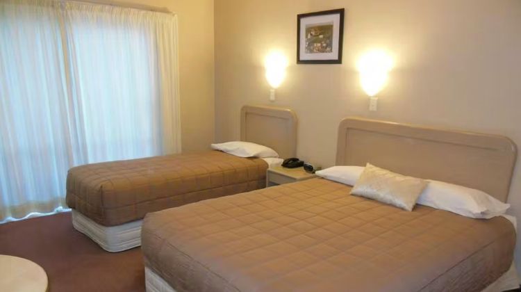 Camelot Arms Motor Lodge Room