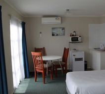 Camelot Arms Motor Lodge Room