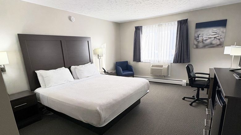 <b>Magnuson Grand Pioneer Inn & Suites Room</b>. Images powered by <a href="https://www.leonardoworldwide.com/" title="Leonardo Worldwide" target="_blank">Leonardo</a>.