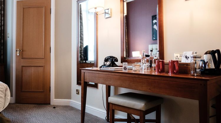 The Mad Hatter Hotel Room