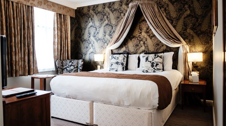 The Mad Hatter Hotel Room