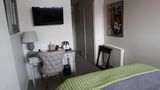 The Falstaff Hotel Room