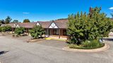 Blazing Stump Motel & Suites Room