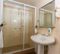 The Q Motel Room