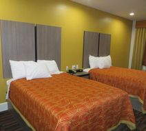 Scottish Inns & Suites Room