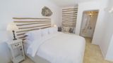 <b>Iconic Santorini, a boutique cave hotel Room</b>. Images powered by <a href="https://www.leonardoworldwide.com/" title="Leonardo Worldwide" target="_blank">Leonardo</a>.