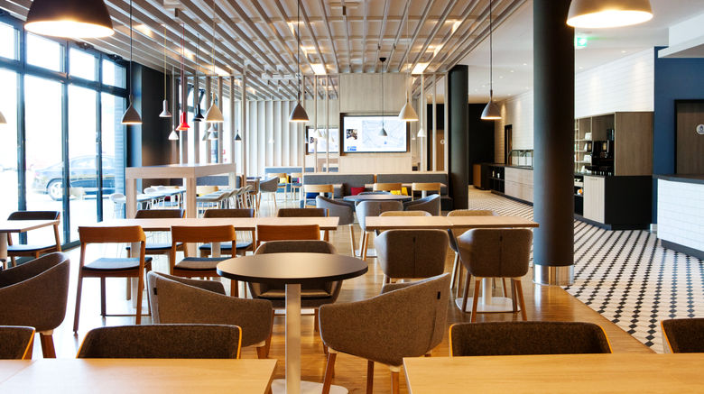 <b>Holiday Inn Express Frankfurt Airport Restaurant</b>. Images powered by <a href="https://www.leonardoworldwide.com/" title="Leonardo Worldwide" target="_blank">Leonardo</a>.