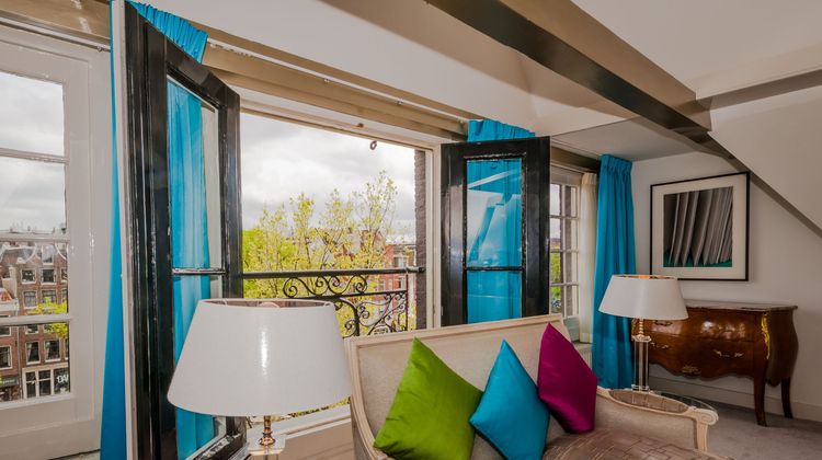 Ambassade Hotel Room