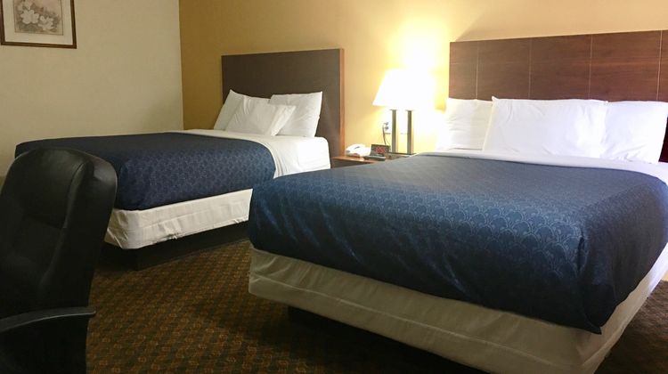 Passport Inn & Suites Room