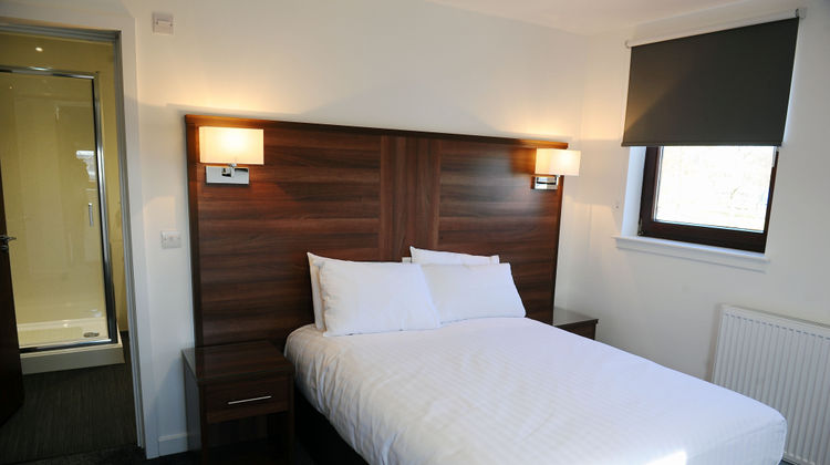 Premier Lodge Hotel Room