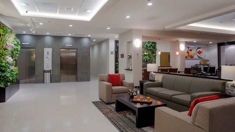 <b>Holiday Inn Express & Suites Juventud Lobby</b>. Images powered by <a href="https://www.leonardoworldwide.com/" title="Leonardo Worldwide" target="_blank">Leonardo</a>.