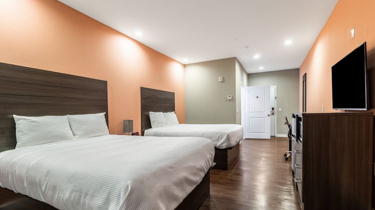 Scottish Inns and Suites Room
