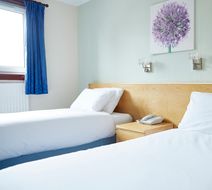 Caledonian Hotel Room