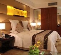 Gehua New Century Hotel Room