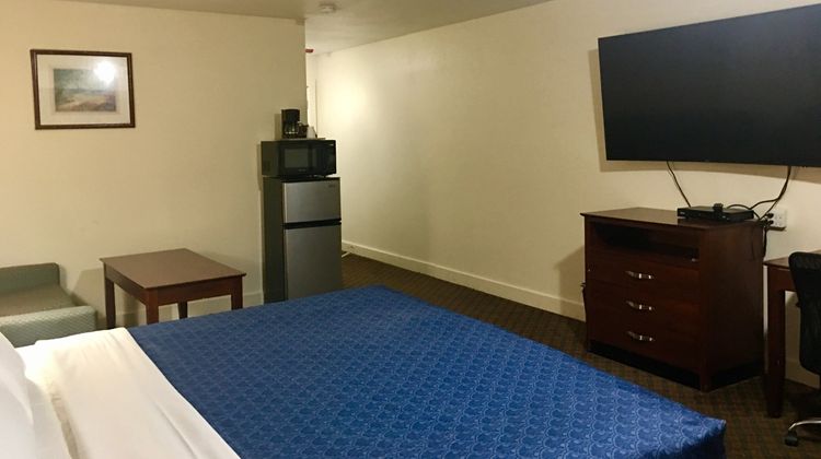 Passport Inn & Suites Room